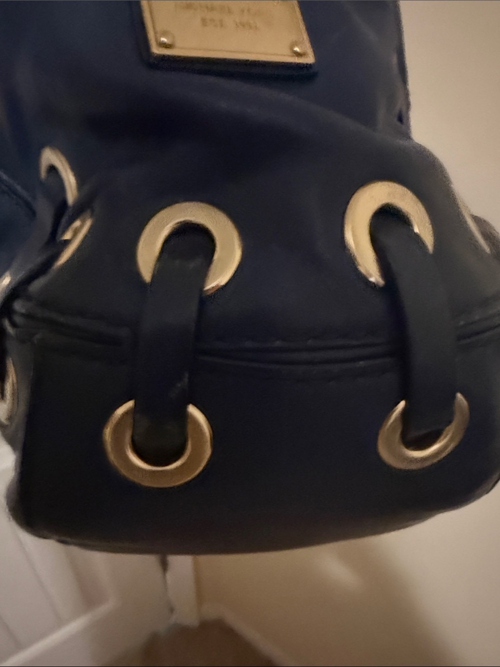 Michael Kors Navy Hobo Bag with Tassel and Gold Eyelets - Picture 6 of 10
